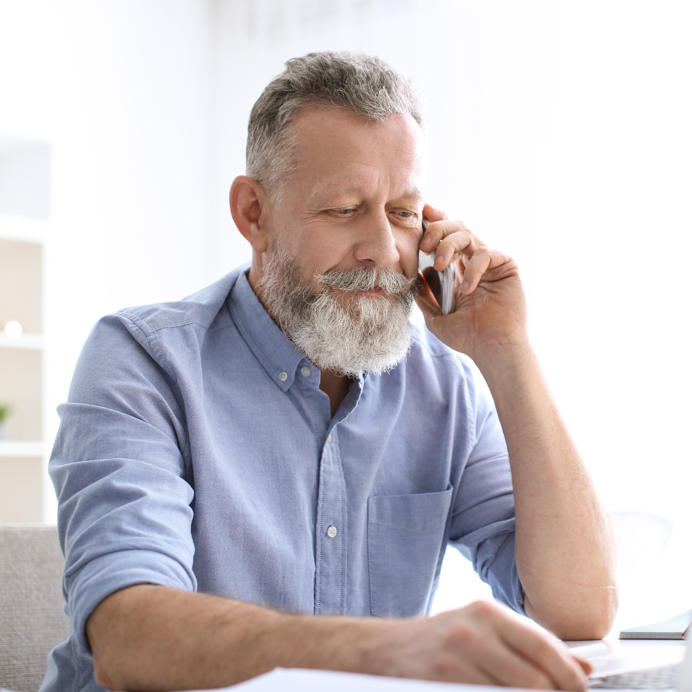 older man on phone