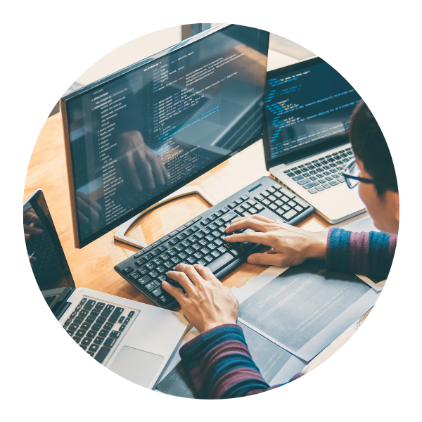 man typing on keyboard